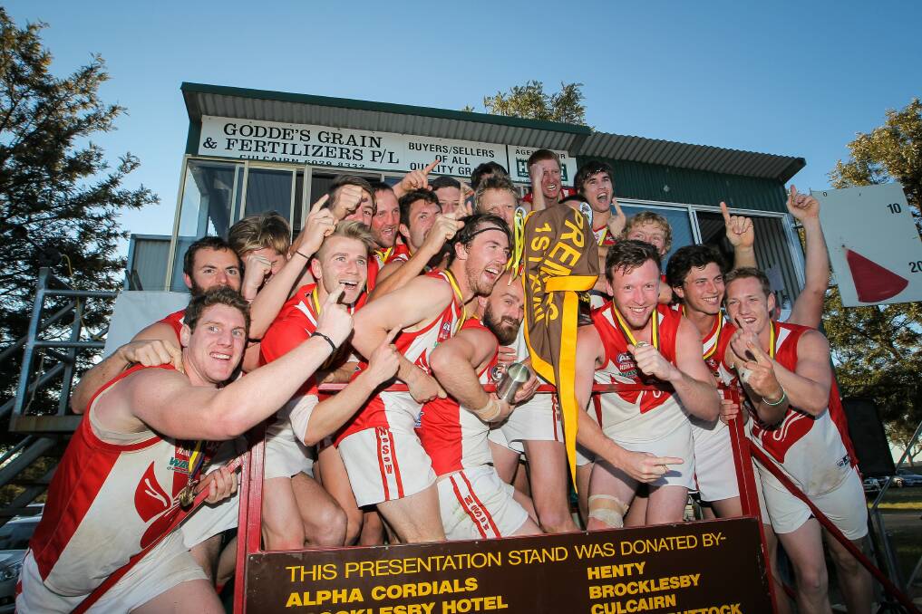 Henty celebrate their win. Picture: DYLAN ROBINSON
