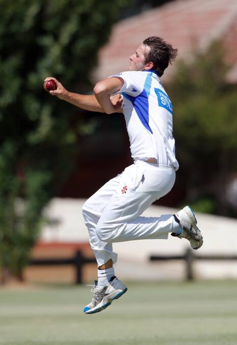 Dave Tassell bowling for Albury.