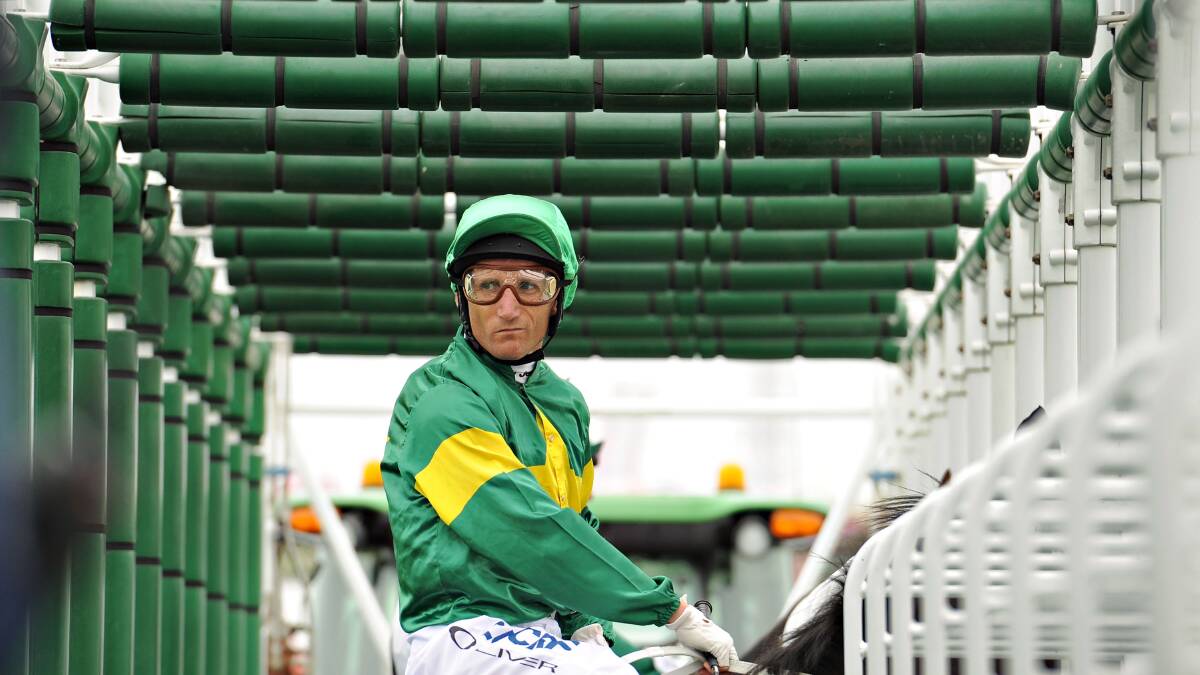 Damien Oliver riding Instrumentalist in the barriers before winning Race 3, the Bitalli Handicap. Picture: GETTY IMAGES