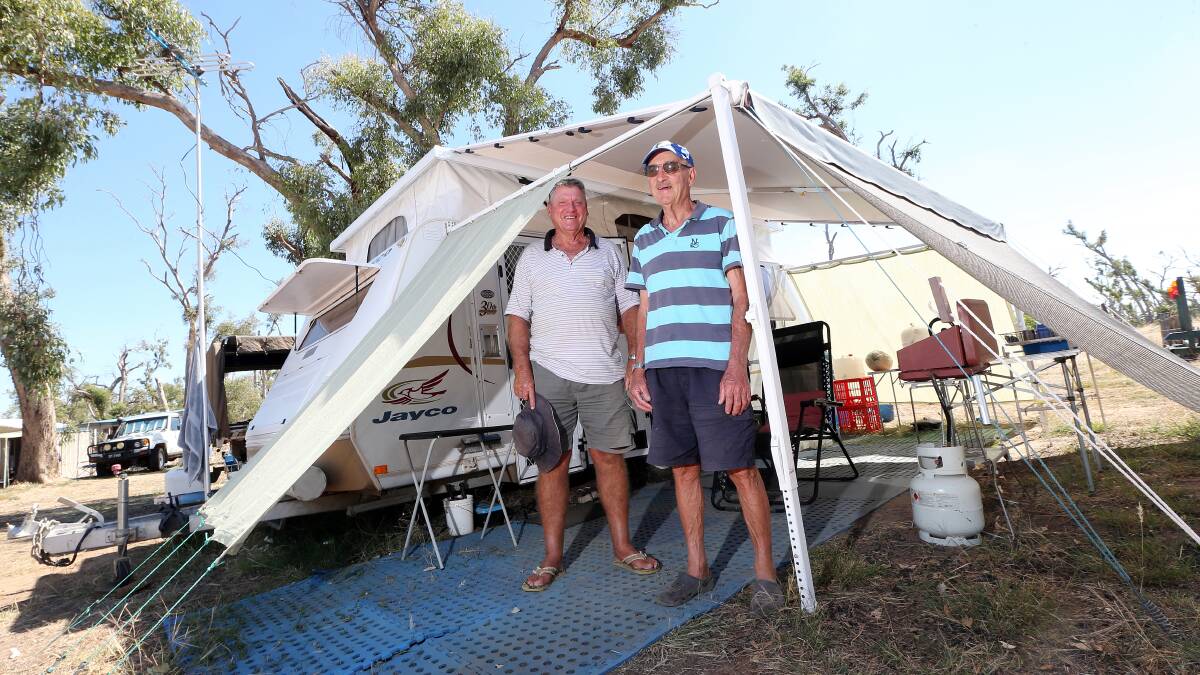 Colin Schirmer and Alan King at their camp site yesterday. Picture: JOHN RUSSELL