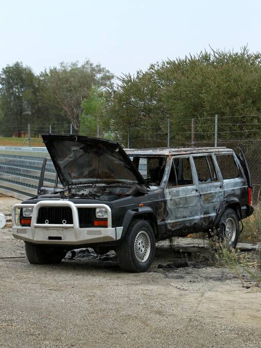 This Jeep Cherokee was burnt to a crisp at the back of North Albury factory on Tuesday night. 