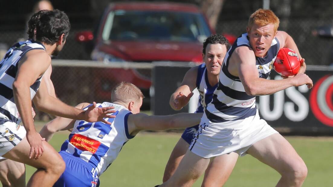 Yarrawonga's Brandon Symes moves the ball down the field.