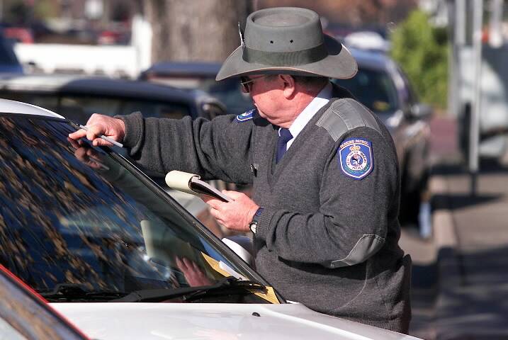 Parking inspectors could be fitted with body cams as a safety measure. P