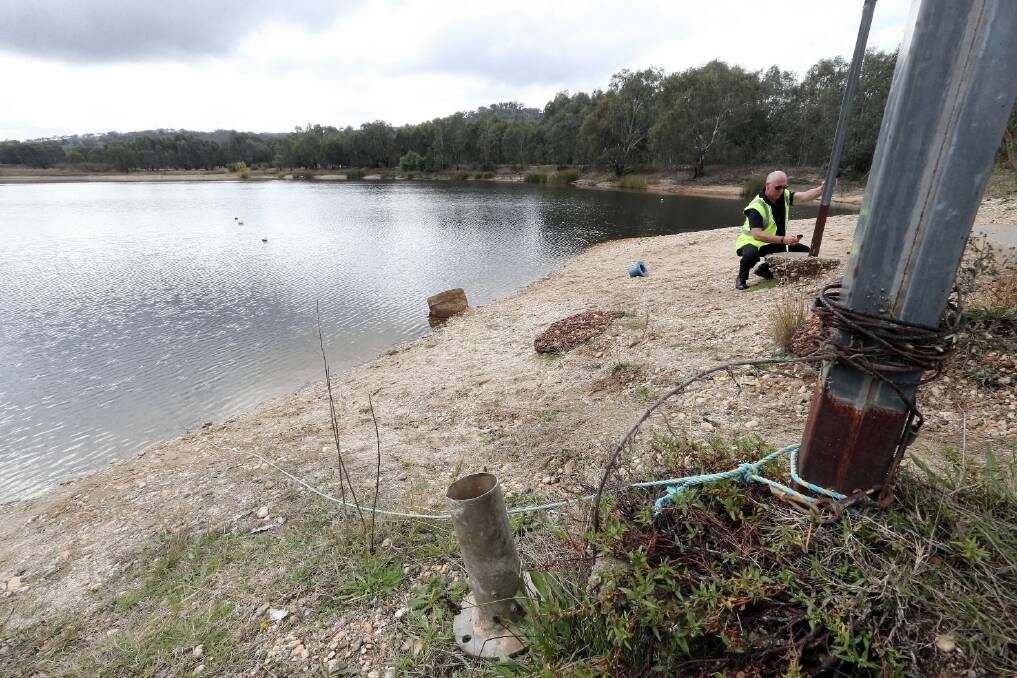 WorkCover NSW district co-ordinator Neville Burt inspected the site where a Sydney man drowned on Tuesday at the gravel pits west of Albury. Picture: JOHN RUSSELL