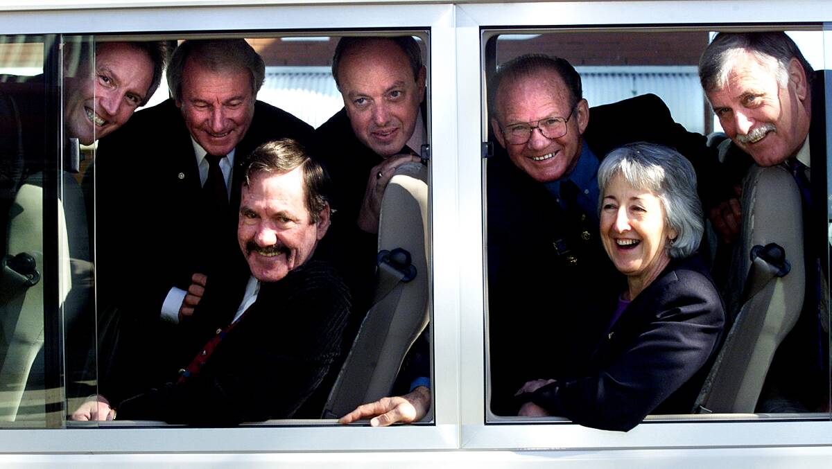 2001 - Howard Butterworth with rotary club members who helped raise $90,000 for an aged care bus. Picture: KATE GERAGHTY