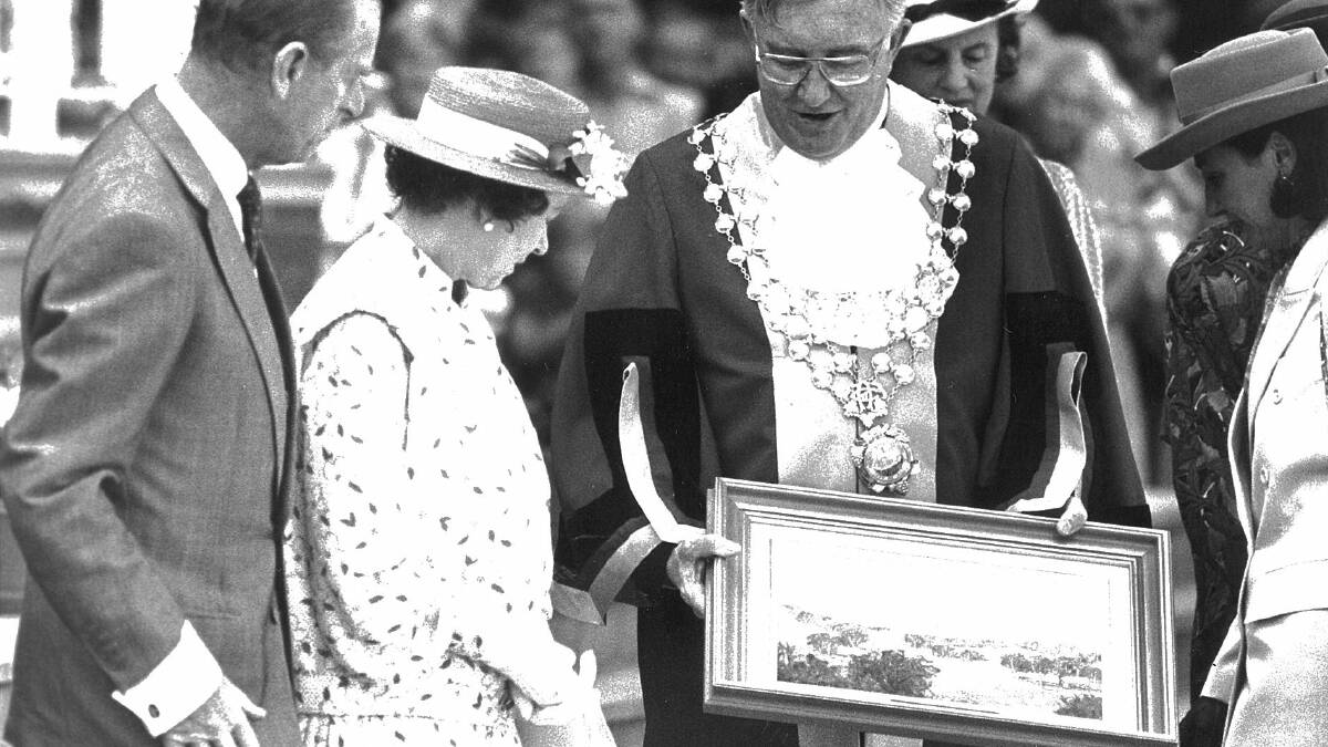 May, 1988 - Prince Philip and Queen Elizabeth II visit Albury-Wodonga. Mayor of Albury John Roach presents the pair with a gift from Albury.