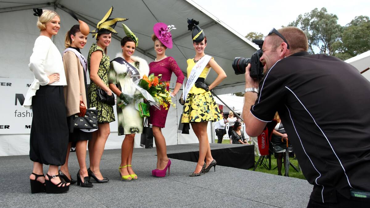 Border Mail photographer John Russell photographs Fashions on the Field entrants last year. 