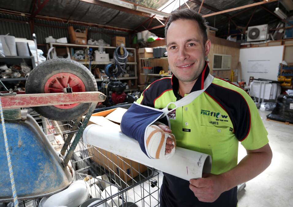 Plumber James Tonkin is out of action after he dislocated his finger. Picture: PETER MERKESTEYN