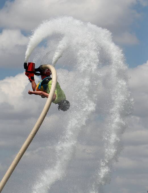  Pete O'Neill demonstrates use of the flyboard at the Mulwala ski club. Picture: KYLIE ESLER