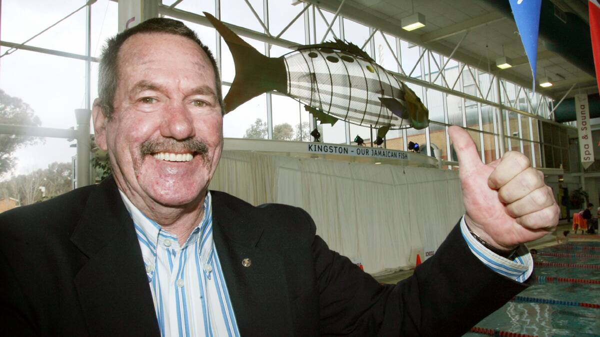 2006 - Howard Butterworth with the Commonwealth Games fish he named ''Kingston''. Picture: RAY HUNT
