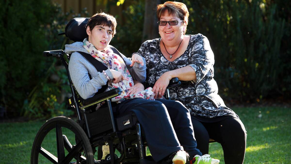 West Albury mother Lynne Wheeler is happy with last night’s news that NDIS funding is on track to help support her daughter Kelly, 20, in coming years. Picture: MATTHEW SMITHWICK