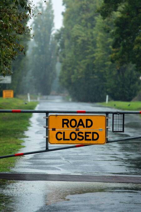 The road was closed at Mungabreena Reserve due to water on the road. Picture: MATTHEW SMITHWICK