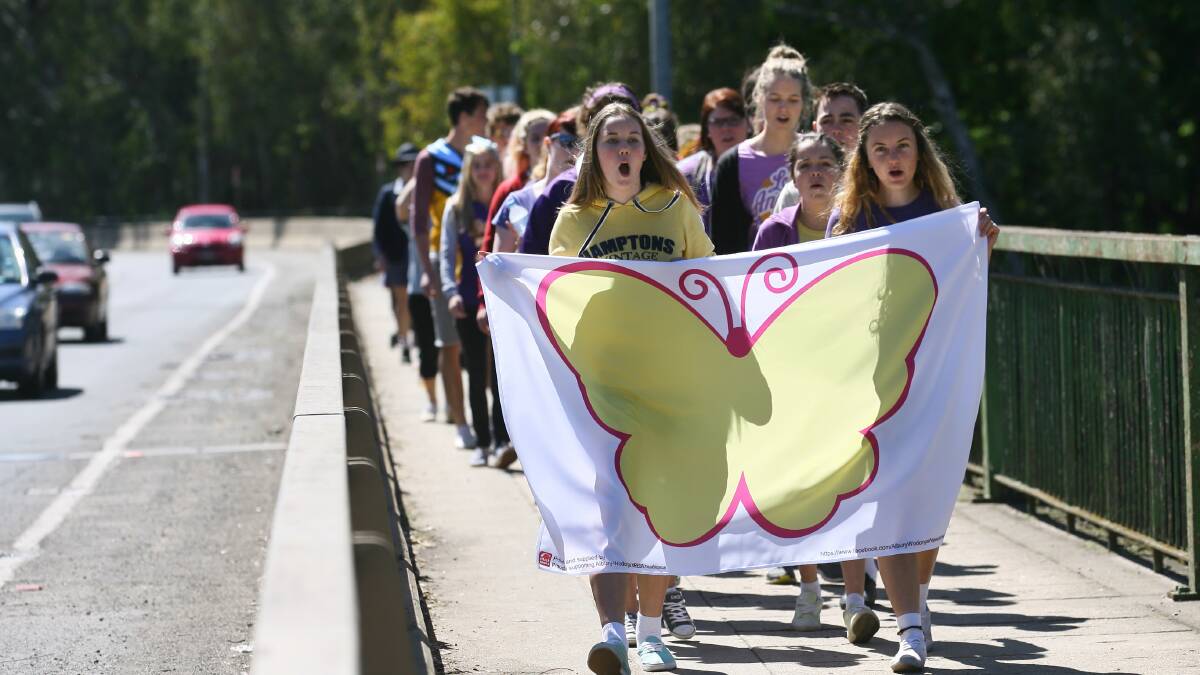 Students from both sides of the Border march in support of Headspace in 2012. 