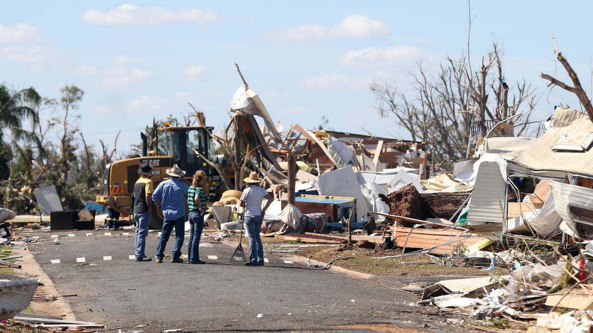 Large machines arrive to clear debris at the Denison County Caravan Park. Picture: JOHN RUSSELL