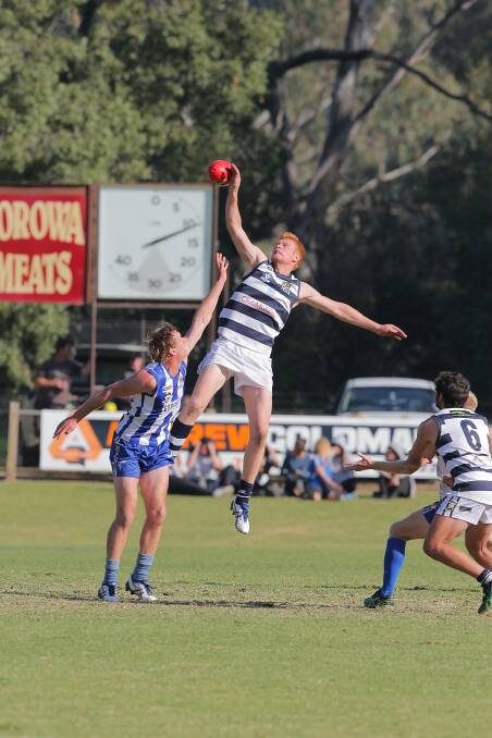 Yarrawonga's Brandon Symes and Roos' Jarred Lane in the ruck.