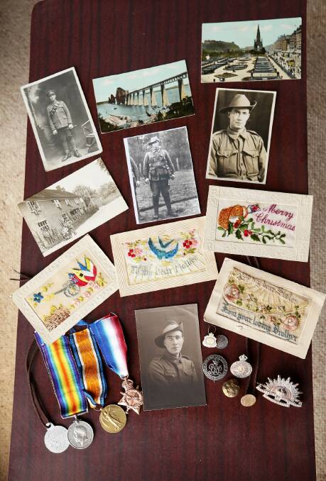 Some of Pte Clarke's belongings, including medals and postcards from the war,