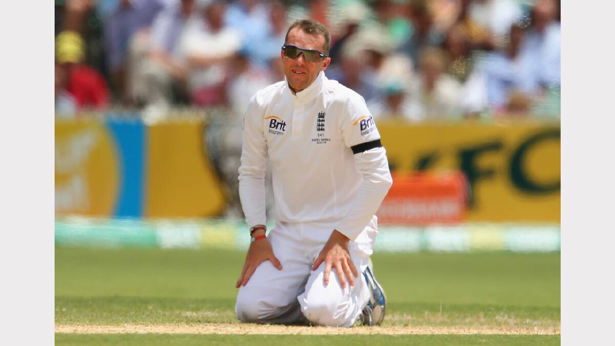 Graeme Swann of England attempts to field the ball from his own bowling. Picture: GETTY IMAGES