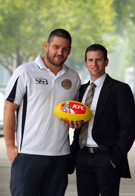 Brendan Fevola O&M general manager Aaron McGlynn at the press conference announcing Fev's  role as interleague coach. 