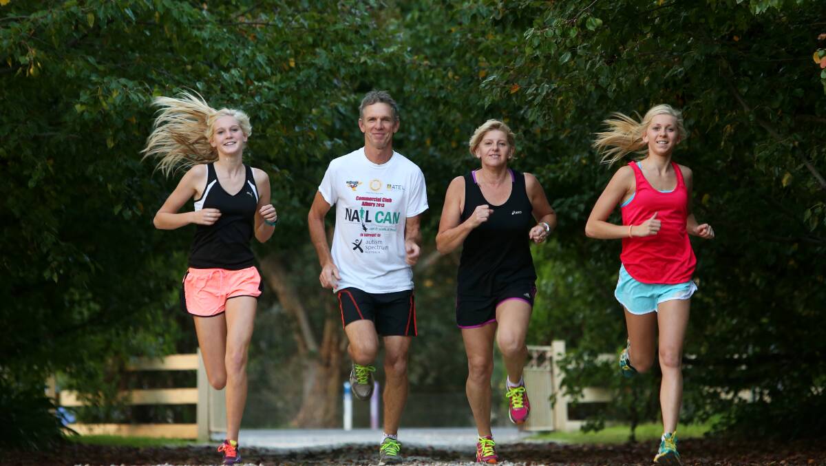  Olivia, 14, Peter, Paula, and Steph Elliot, 17, of Bundalong, will run Nail Can Hill as a family.  Picture: MATTHEW SMITHWICK