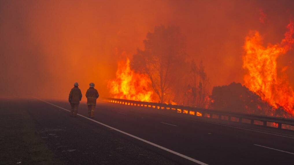 Fire fighters spent the weekend at an out of control fire at Maddens Plains. Picture: Mick Reynolds, NSW RFS
