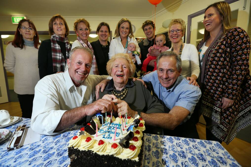 Former Rutherglen resident Lila Govett celebrated her 100th birthday yesterday at Yackandandah’s Yamaroo Hostel. The great grandmother shared the day with her sons George, of Port Douglas, and Denzil, of Wodonga, as well as other family members. Picture: MATTHEW SMITHWICK
