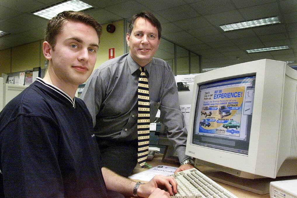 Robert Lappin, right, pictured in September 2000 with then graphic design apprentice Marcus Kostelac.