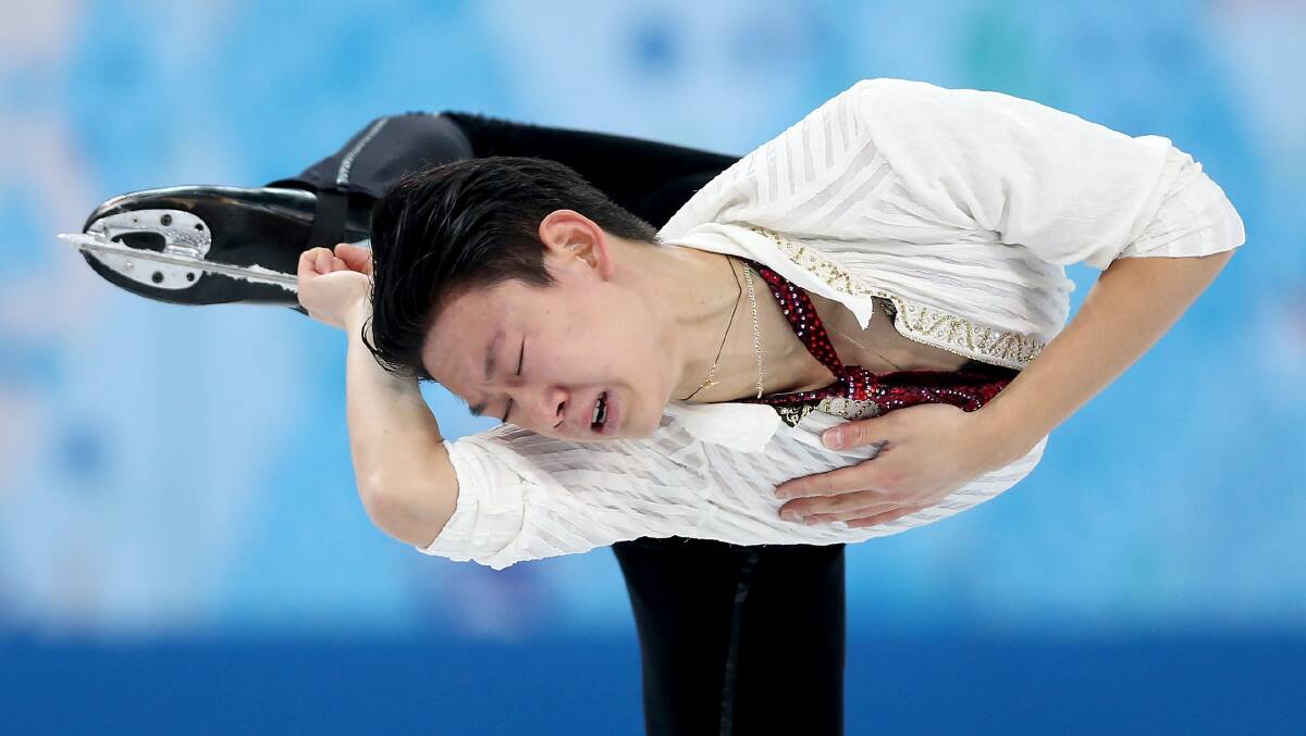Denis Ten of Kazakhstan competes during the Figure Skating Men's Free Skating on day seven of the Sochi 2014 Winter Olympics at Iceberg Skating Palace. Photo by Matthew Stockman/Getty Images.