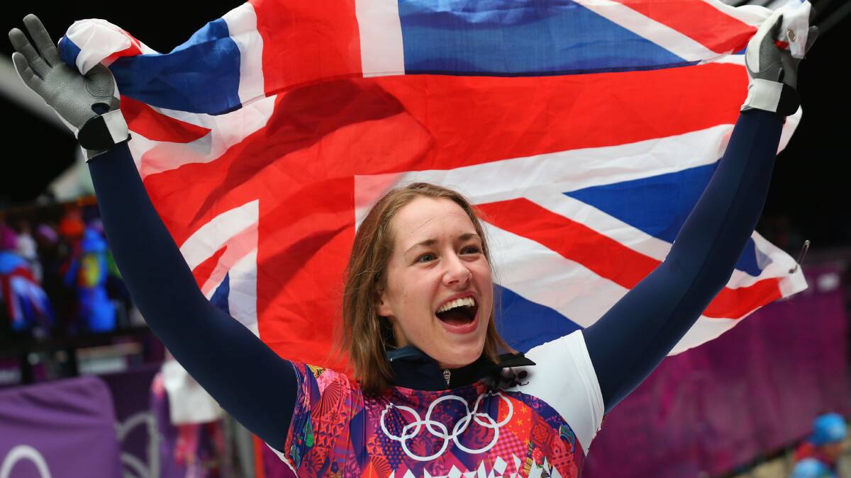 Lizzy Yarnold of Great Britain celebrates winning the gold medal during the Women's Skeleton on Day 7 of the Sochi 2014 Winter Olympics.  Photo by Alex Livesey/Getty Images