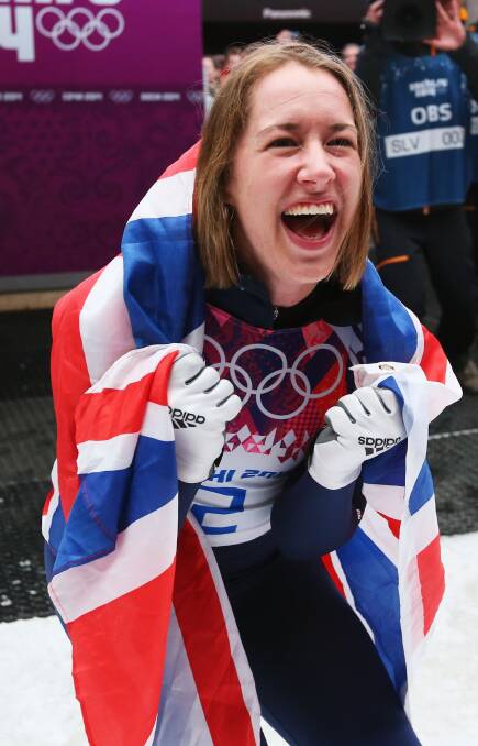 Lizzy Yarnold of Great Britain celebrates winning the gold medal during the Women's Skeleton on Day 7 of the Sochi 2014 Winter Olympics.  Photo by Alex Livesey/Getty Images