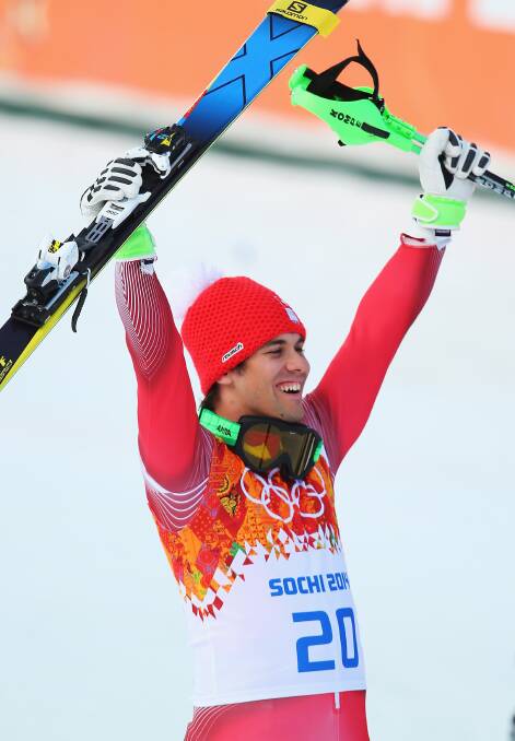 Sandro Viletta of Switzerland jubilates during the Alpine Skiing Men's Super Combined Downhill on day 7 of the Sochi 2014 Winter Olympics at Rosa Khutor Alpine Center. Photo by Clive Rose/Getty Images