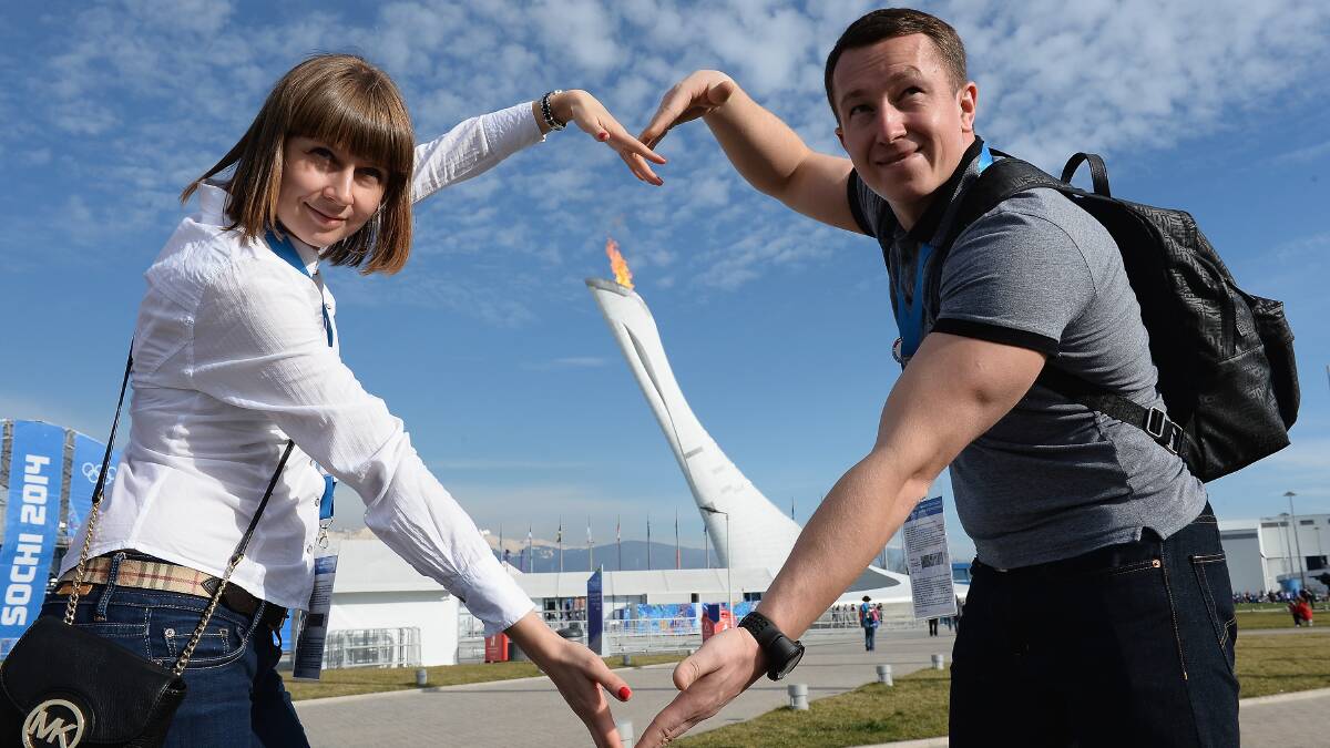 Irina and husband Alexis celebrate St Valentine's day in front of the Olympic cauldron in the Olympic Park  in Sochi, Russia. Photo by Pascal Le Segretain/Getty Images
