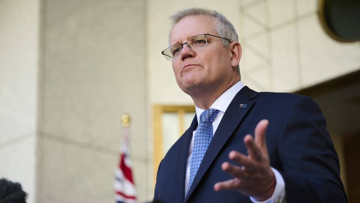Scott Morrison is betting that it's he who has his finger on the pulse of the nation - not the more reluctant premiers. Picture: Getty Images