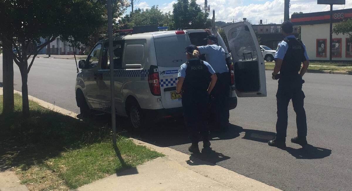 ARREST: Police speak to Amandeep Singh after his arrest at a Union Road home on Thursday. Pictures: BLAIR THOMSON
