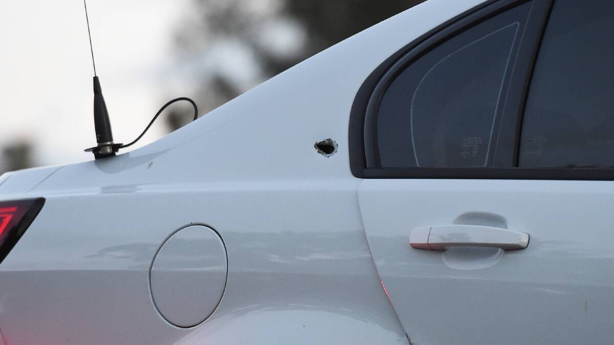 PHOTOS: Rammed police vehicle with bullet hole removed from Barnawartha reserve