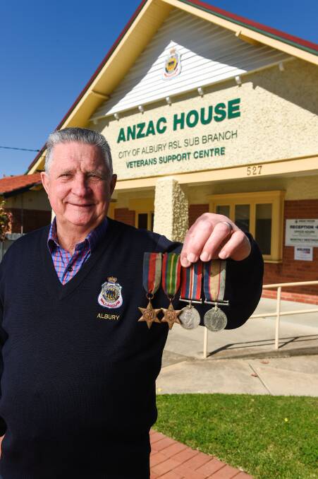 SEARCH: The four medals were handed in to the Albury RSL, leading president Graham Docksey to appeal for help to track down the owner's next of kin. 