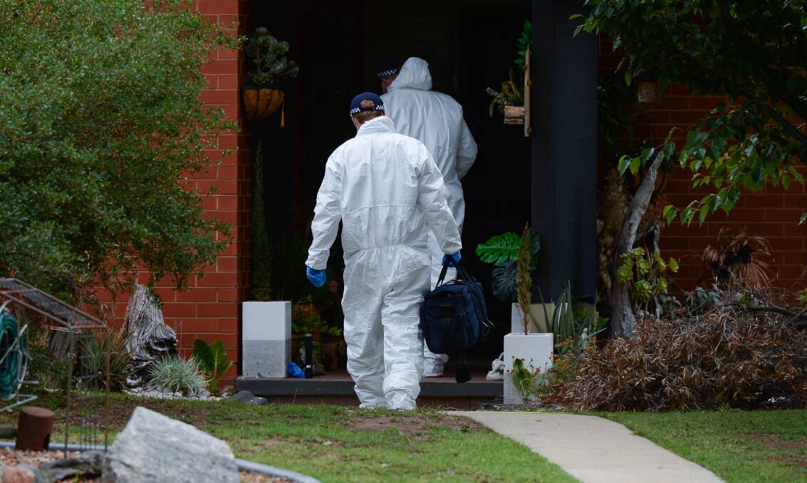 Police search Bourke's home. 