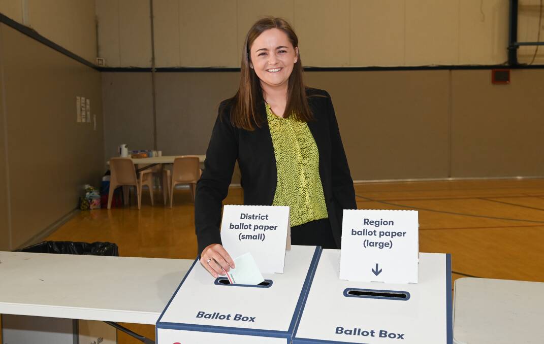 Jacqui Hawkins casts her vote on Saturday morning. 