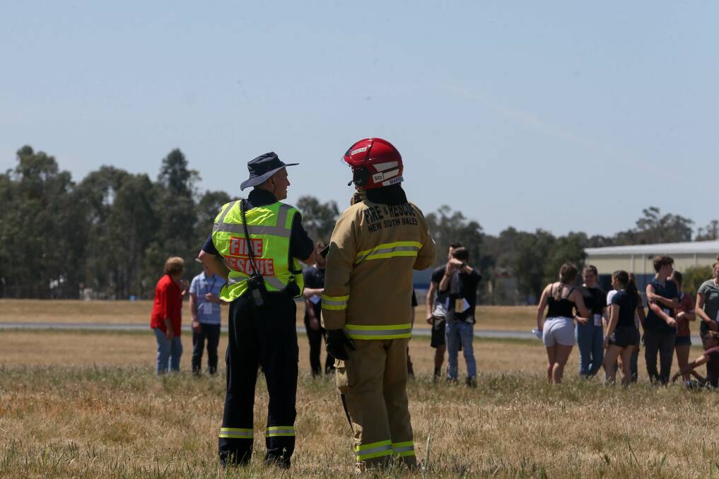 ON SCENE: 40 students from Trinity Anglican College were involved in the simulated plane crash in Albury on Wednesday, suffering various "injuries". The emergency excercise is run at the site every year. Picture: TARA TREWHELLA