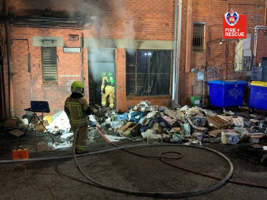 Firefighters at the scene on Monday night. Picture by Fire and Rescue NSW