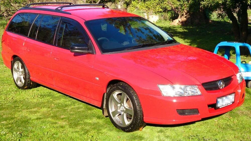 The stolen red Holden Commodore wagon. Picture supplied