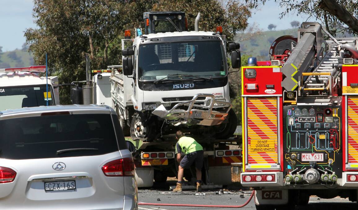 TRAGEDY: The woman's vehicle hit a truck carrying an earthmover. Picture: BLAIR THOMSON