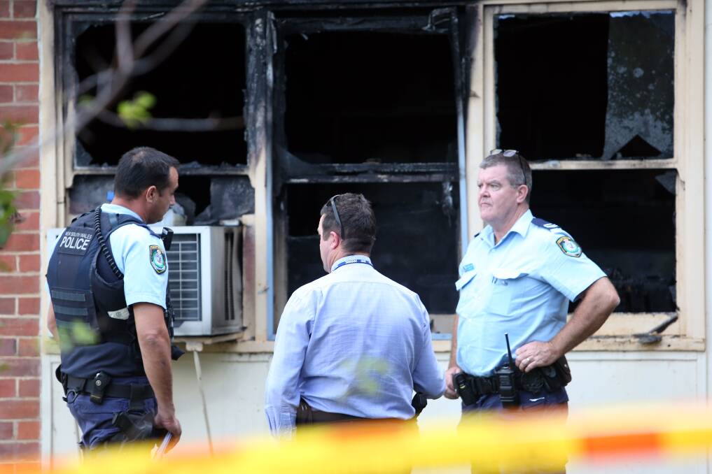 BURNT: Police at the scene of Tuesday's house fire in North Albury. 