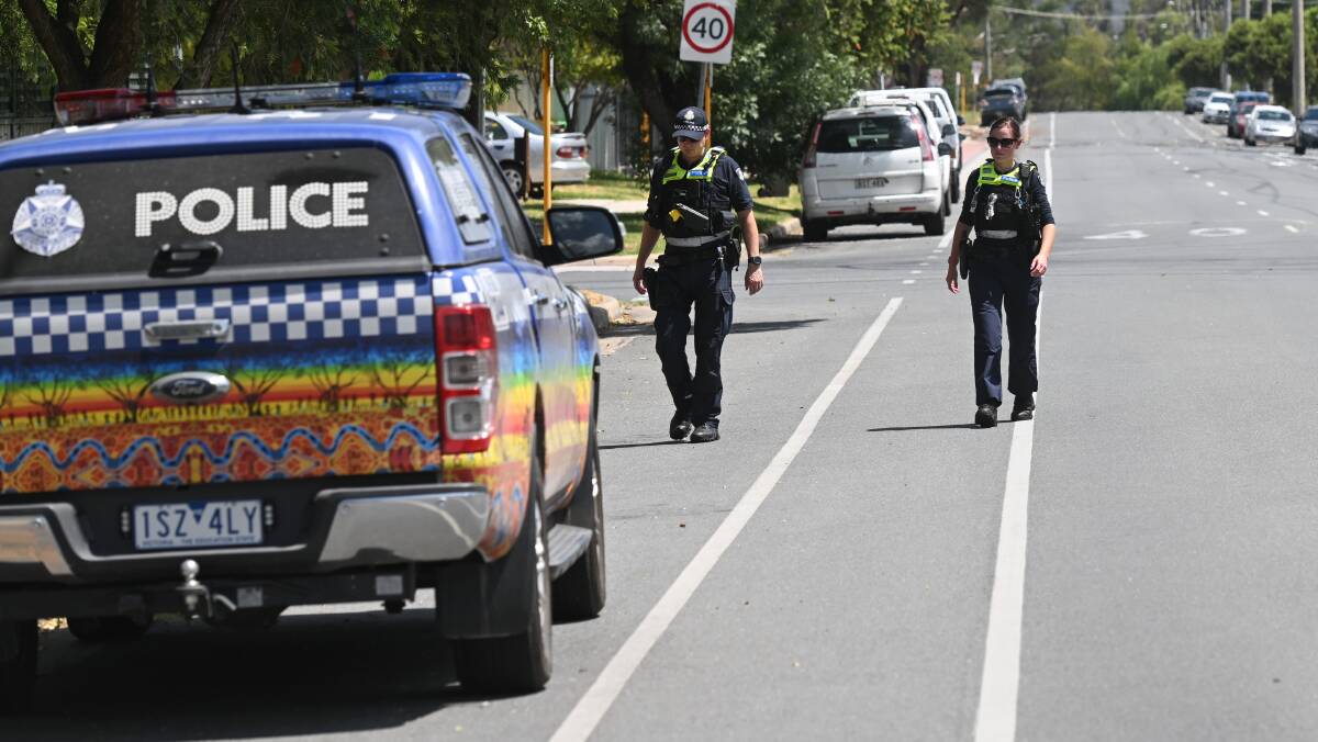 Wodonga officers on Woodland Street after a man was arrested for allegedly brandishing an imitation gun on Monday. Picture by Mark Jesser