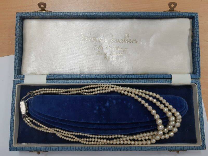 OWNER SOUGHT: Police recovered the pearls during a search warrant last month. 