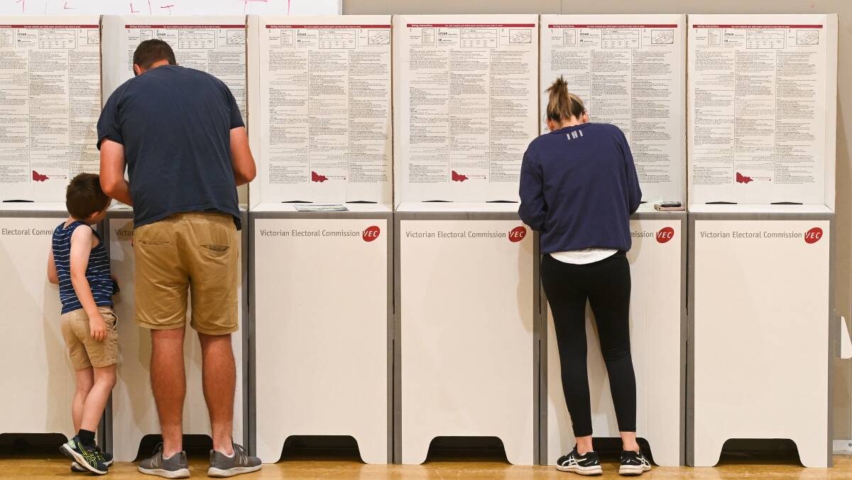Voters in Wodonga on Saturday morning. Pictures by Mark Jesser