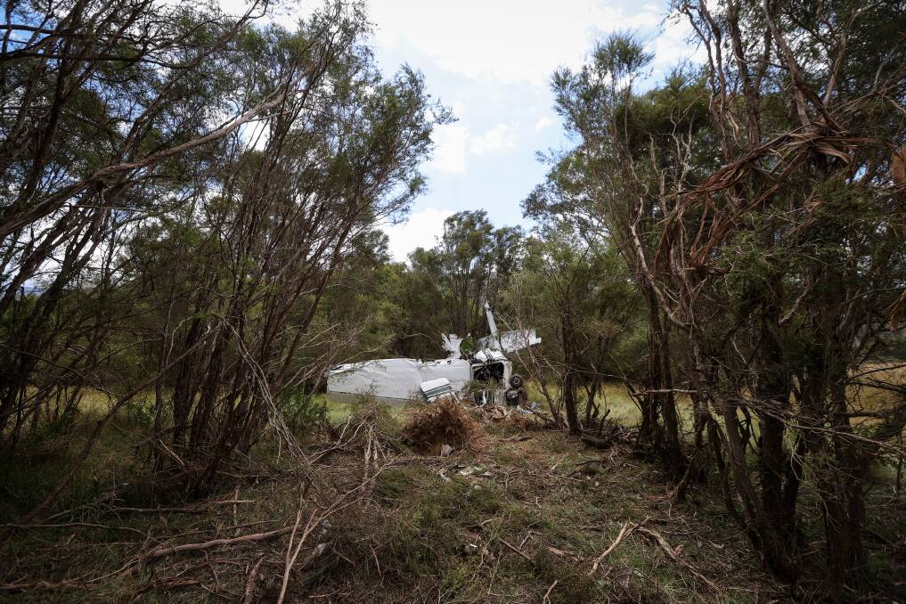 The pilot managed to survive this crash at Porepunkah yesterday, with the Cessna hitting trees and the ground. Picture by James Wiltshire