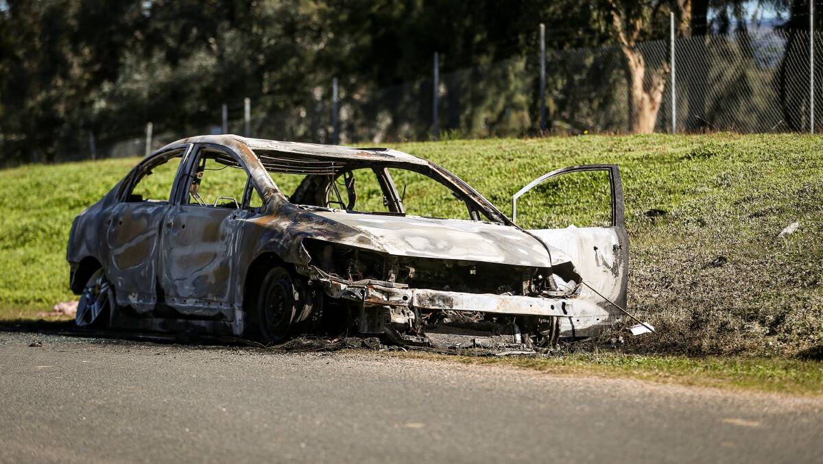 BURNT OUT: The damaged vehicle on Kremur Street on Friday morning. Picture: JAMES WILTSHIRE