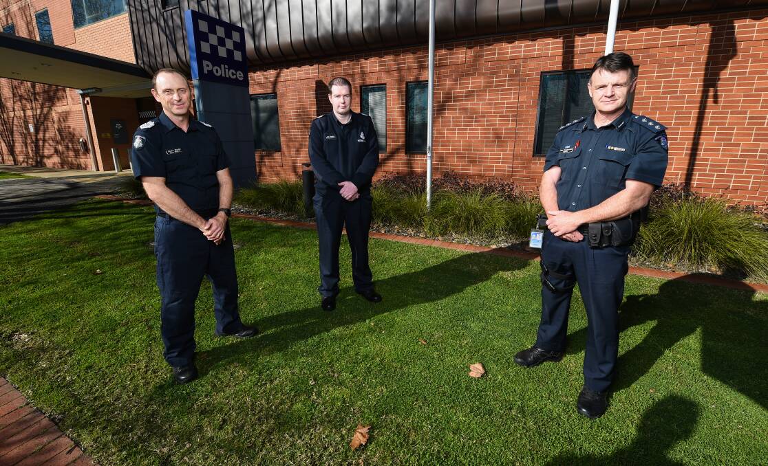 ON THE JOB: Senior sergeant Shane Martin and Joel Hughes, with Inspector Paul Hargeaves, at the Wodonga station. Police are seeking views on crime and safety through the Wodonga Eyewatch Facebook page. Picture: MARK JESSER