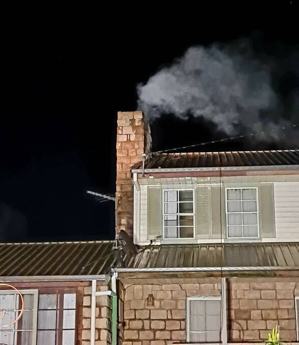 FALSE CHIMNEY: Flames were spotted coming out of a fake chimney. Picture: FIRE AND RESCUE NSW