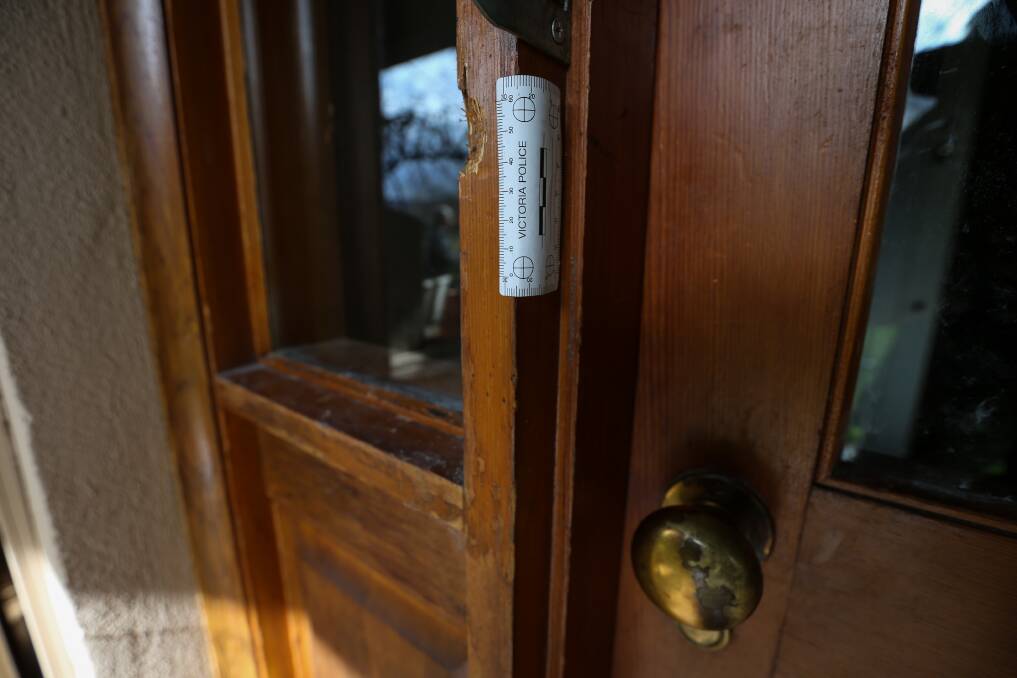 A police evidence marker at the home. File photo